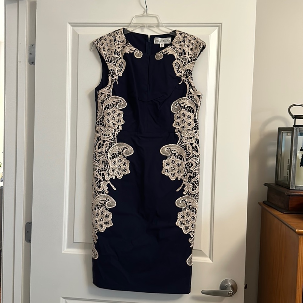 Stunning navy dress with appliqué detail